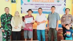 Kolaborasi Babinsa Sugio Jaga Kelancaran Pembagian BLT di Karangsambigalih